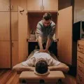 man does massage guy that lying down cabinet indoors_1042628 570315 1